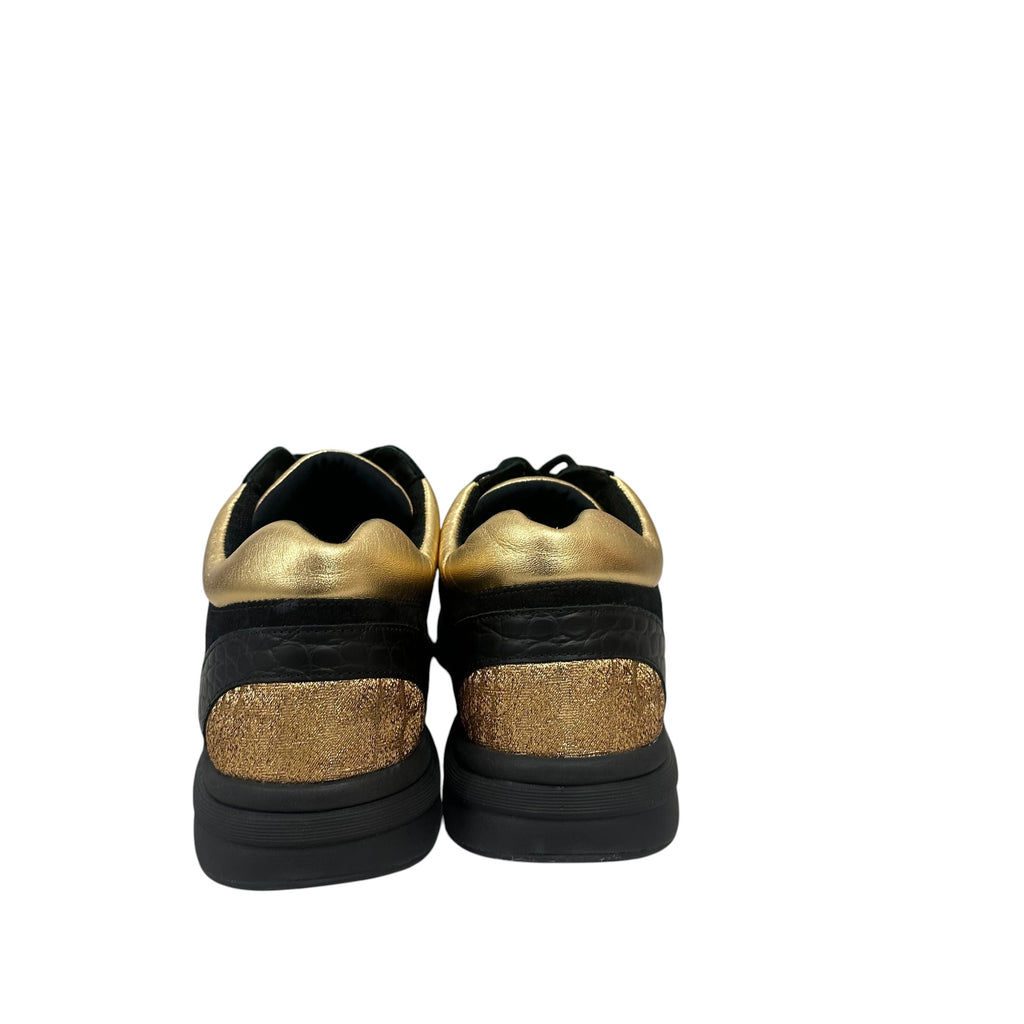 CHANEL Black and Gold CC Emblem Low TopTrainer Sneakers